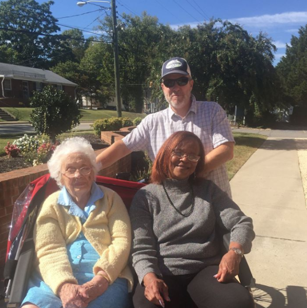 Travis Shaw with residents